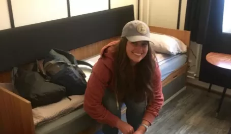 Haley, excited to unpack her bags in our hostel.