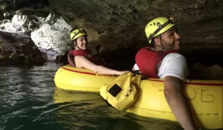 Relaxing ride along the river and through the caves