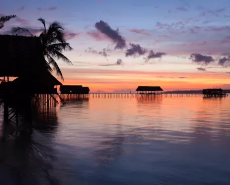 Sunset at an ocean resort in Raja Ampat, West Papua, Indonesia