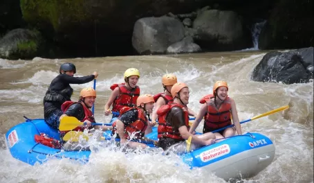 Feeling the rush of the rapids during a whitewater rafting trip in Costa Rica
