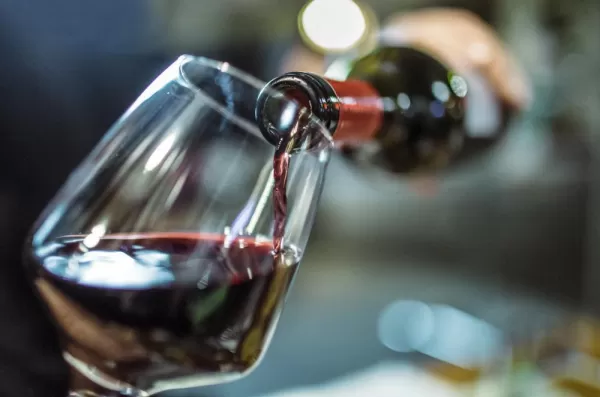 Enjoy a glass of local red wine