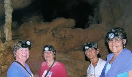 A group enjoys the ATM cave tour