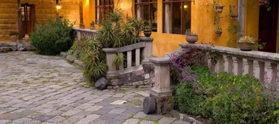 Take a stroll through the beautiful courtyard at San Agustin de Callo