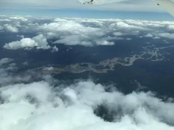 A view of the Demerara River between a break in the clouds