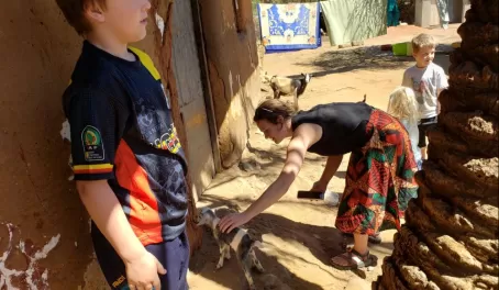 Petting the baby goats