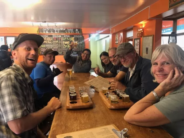 After exploring Pumamarka and then enjoying a hike down to the town of Ollantaytambo we visited the local brewery with our group.
