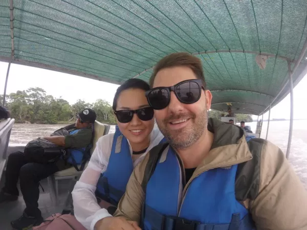 On the motorized canoe, just after landing in the Amazon.