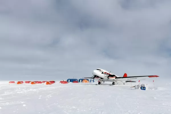 Basler plane parked at South Pole Camp. Courtesy Christopher Michel, Antarctic Logistics & Expeditions