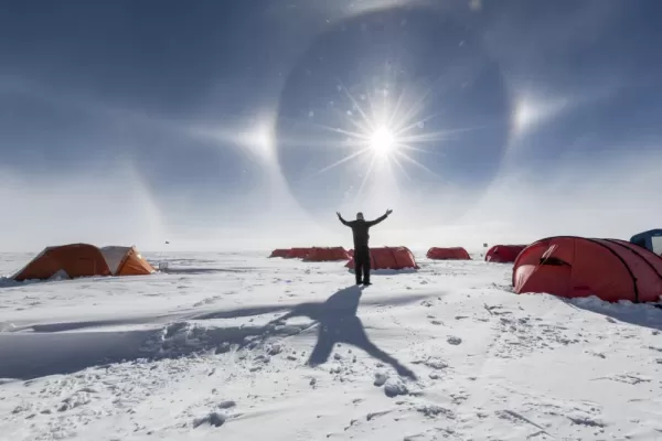 Enjoying the sun at South Pole Camp. Courtesy Christopher Michel, Antarctic Logistics & Expeditions