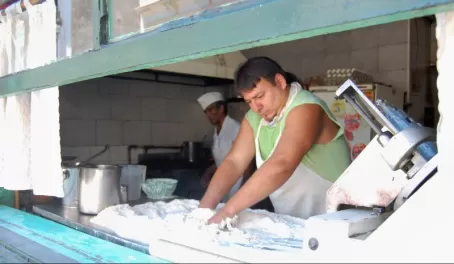 Pedro gives the empanadas his personal touch