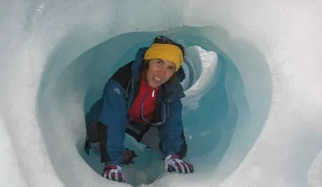 Crawling through an ice tube on the Perito Moreno Glacier 