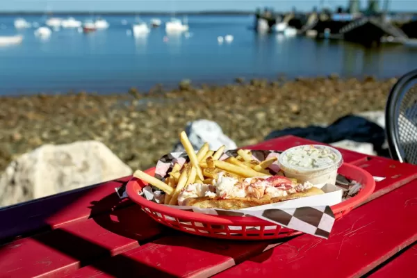 A lobster roll by the harbor