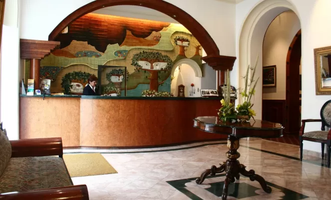 Experience a warm welcome at Hotel Crespo reception
