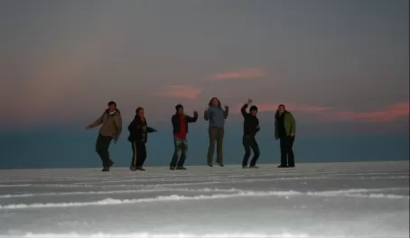 The international gang celebrating sunset 