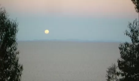 full moon rising over Lake Titicaca