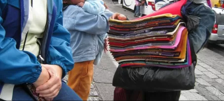 The great scarf saleslady makes a sale (to me)