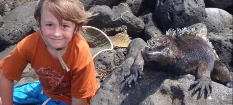 Making friends with a marine iguana in the Galapagos