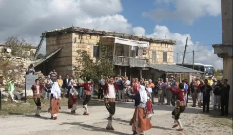 Locals dancing in traditional style.