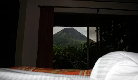 the view from our bed at Arenal Manoa