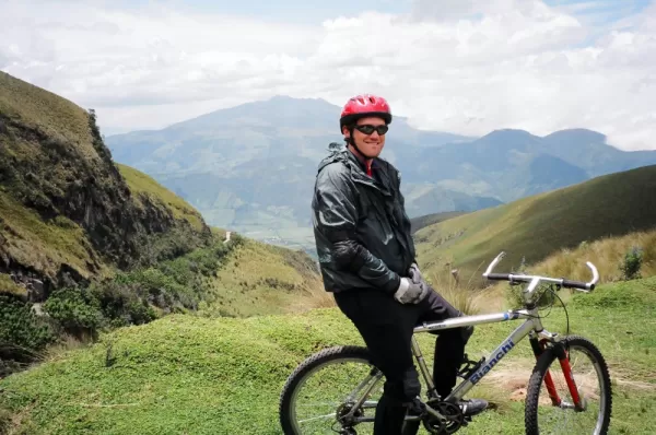 Ecuador traveler enjoying the view on a biking tour