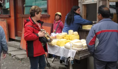 Checking out cheese at the Puerto Montt open Market