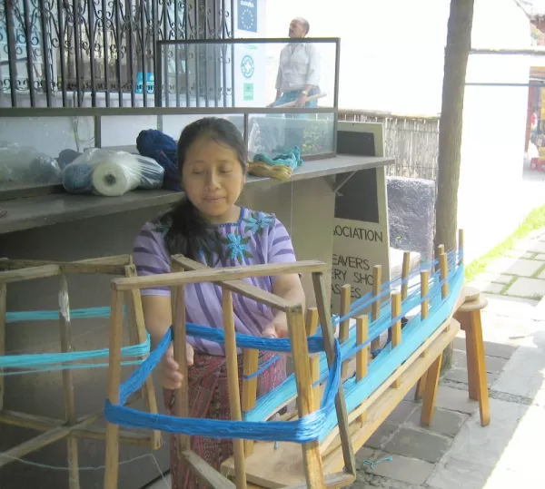 Maya woman weaving on Guatemala tour