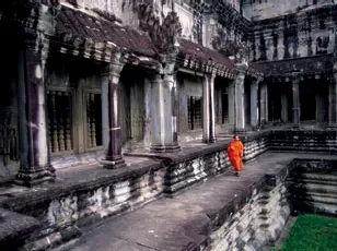 A monk in an Asian Temple Courtyard 