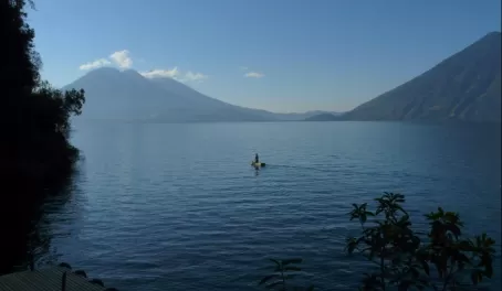 Paddling a cayuco, the traditional Lago Atitlan boat used by locals for fishing and crabbing