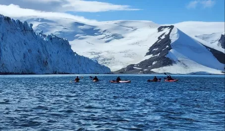 Kayakers out in Antarctica.