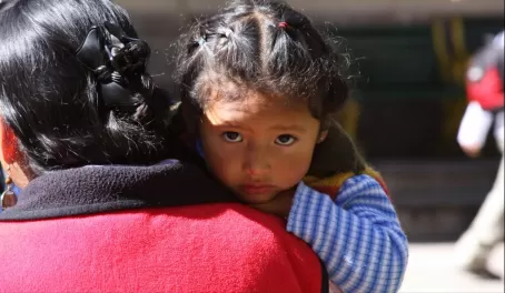Cusco, Peru: Mother & child in market
