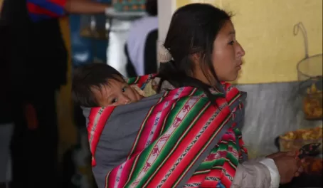 Cusco, Peru: Mother & child in market