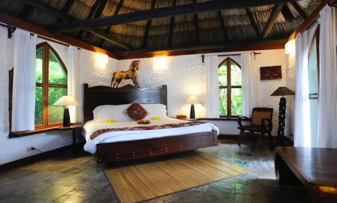 Luxurious bedroom at the Lodge at Chaa Creek