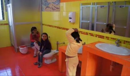 Mantay kids in their almost finished bathroom