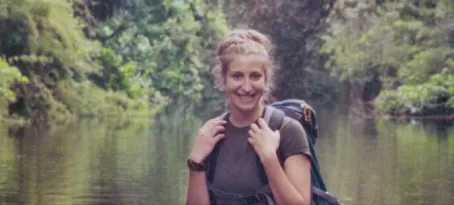 Beth crossing the river en route to Actun Tunichil Muknal cave