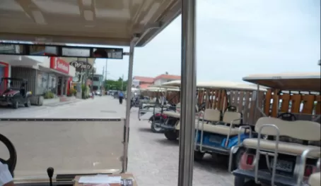 Ambergis Caye!  Golf carts are the mode of  transportation