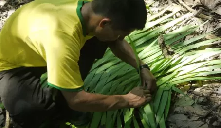 Weaving palm leaf