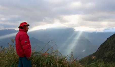 Our guide as the sun breaks through the clouds