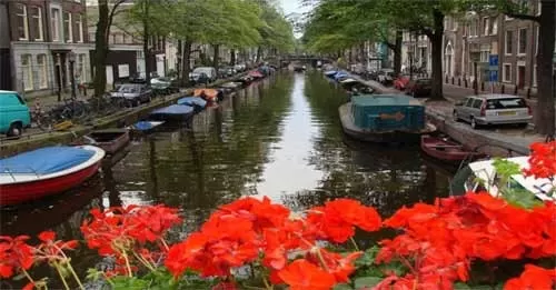 Wander along the canals of Amsterdam on your luxury river cruise