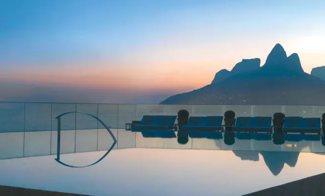Catch the last rays of sun from the pool at Experience exceptional cuisine at Hotel Fasano Al Mare