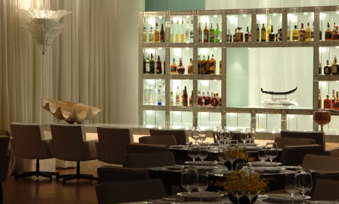 Relax in the bar and experience exceptional cuisine at Hotel Fasano Al Mare