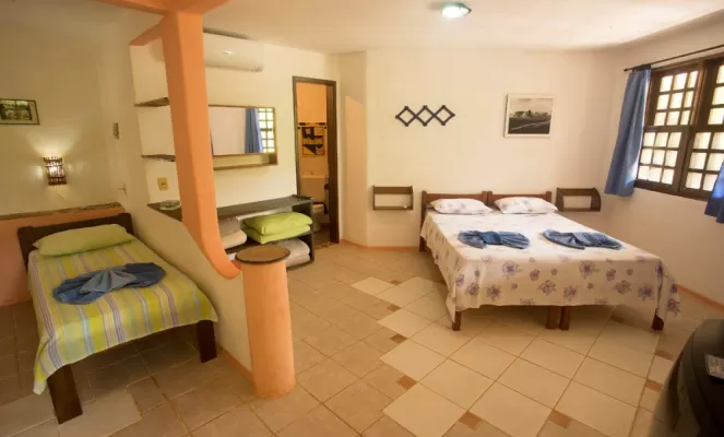 A comfortable family suite at Pousada Canto no Bosque