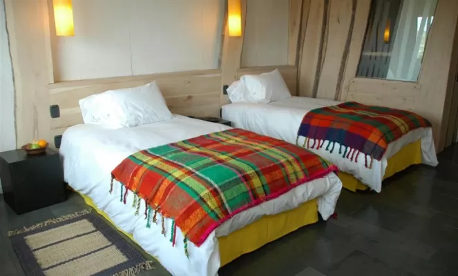 Stay in a comfortable twin room at Remota