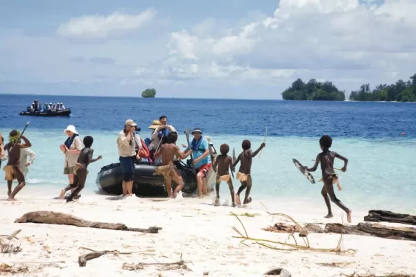 Children of the Solomon Islands greet your zodiac