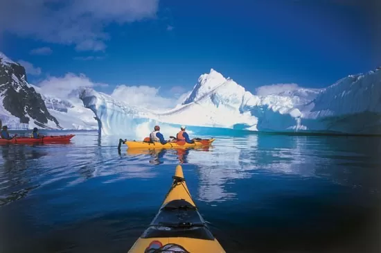 Paddling around icebergs, accompanied by seals, penguins or whales is a surreal Antarctic experience