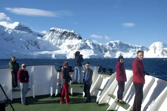 Taking in the view of the Antarctic mountains from the deck of Polar Pioneer
