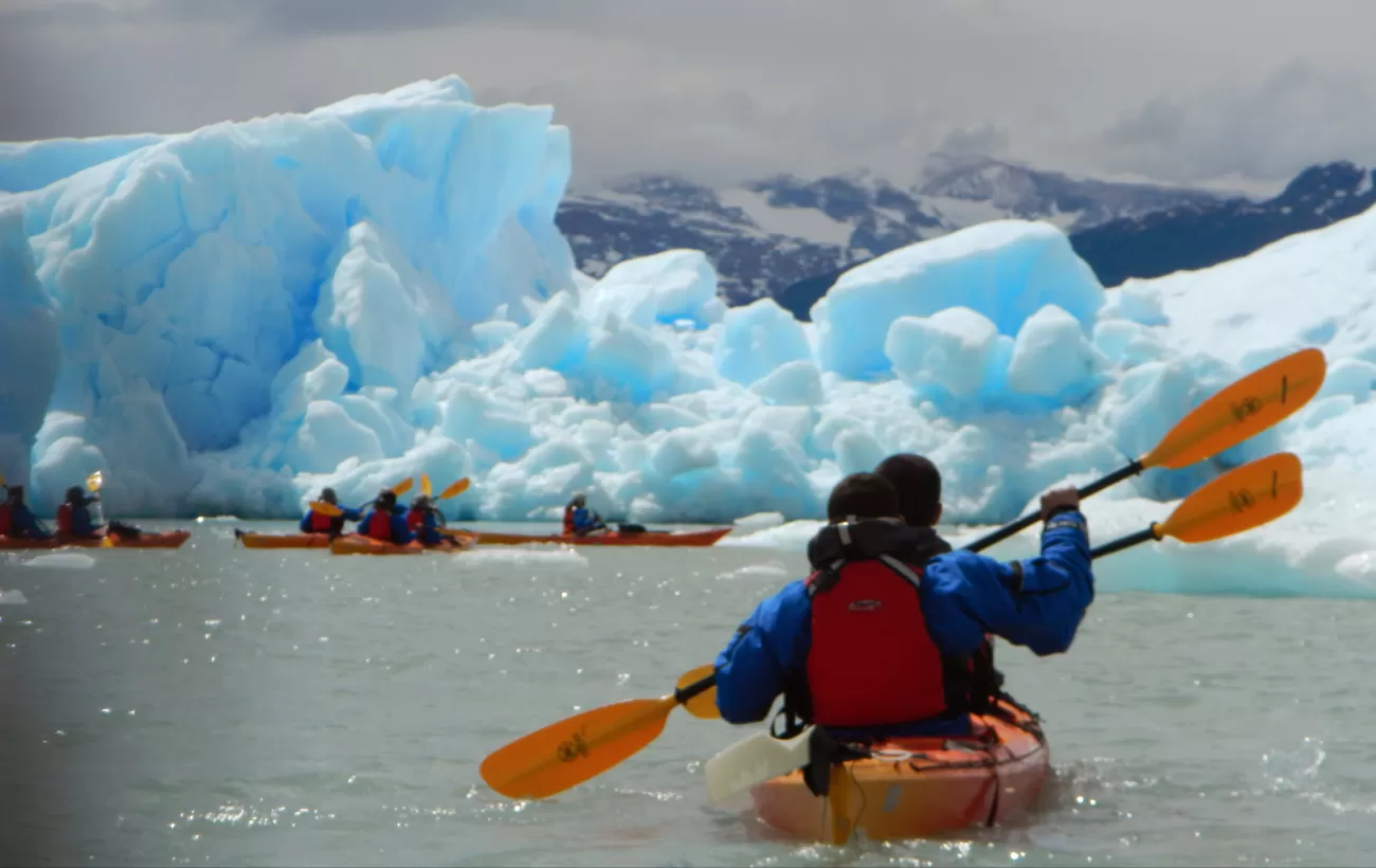 Kayak alongside icebergs while on an Argentine adventure near El Calafate