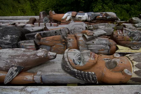 A pile of old totem poles.