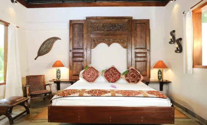 The master bedroom in one of the Lodge at Chaa Creek's private cottages