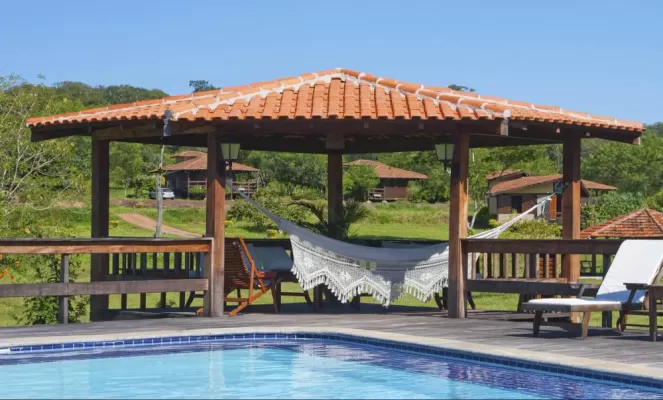 Relax by the pool at Pousada Santa Esmeralda 