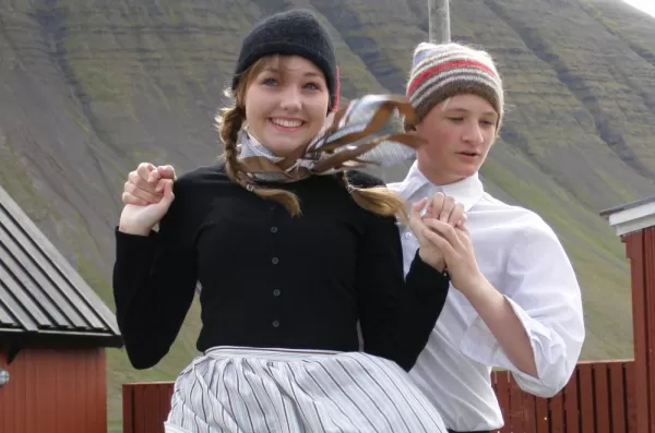 Locals of Iceland perform a traditional dance.
